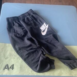 Nike Kids Black Sweatpants with White Logo